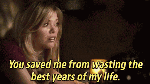 a woman is sitting in front of a candle and saying you saved me from wasting the best years of my life