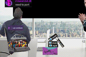a man sitting in front of a window with a tool bag on his back that says lean contributor on it