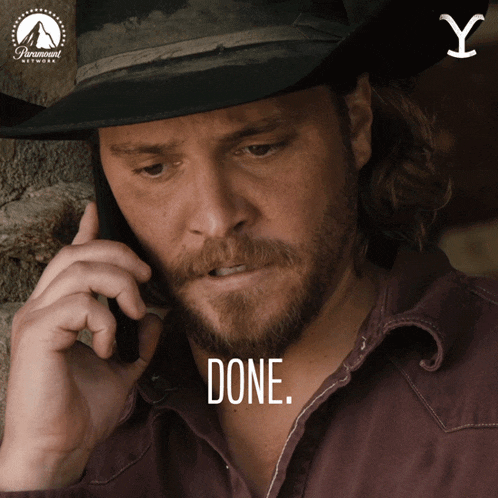 a man in a cowboy hat is talking on a cell phone and the word done is on the bottom right