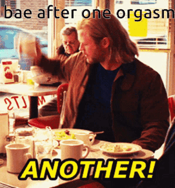 a man sitting at a diner table with the words bae after one orgasm another written above him