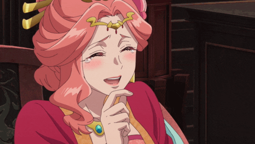 a woman with pink hair is sitting in a chair with her mouth open