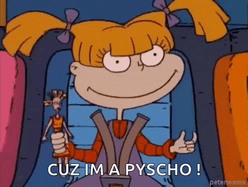 a cartoon character from rugrats is sitting in a car seat holding a doll and giving a thumbs up .