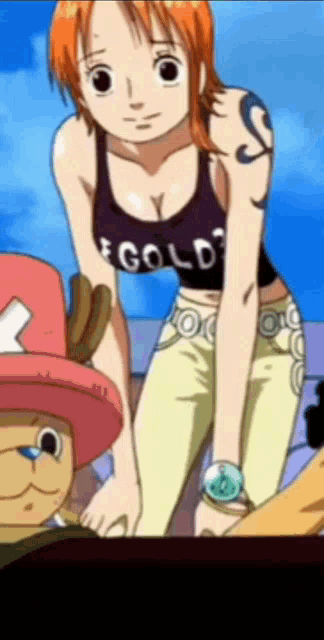 a girl in a black tank top that says gold on it