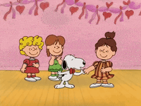 a cartoon of snoopy holding hands with two girls in front of a pink wall with hearts on it