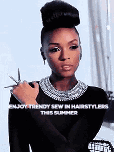 a woman in a black dress is holding a pair of scissors in her hand