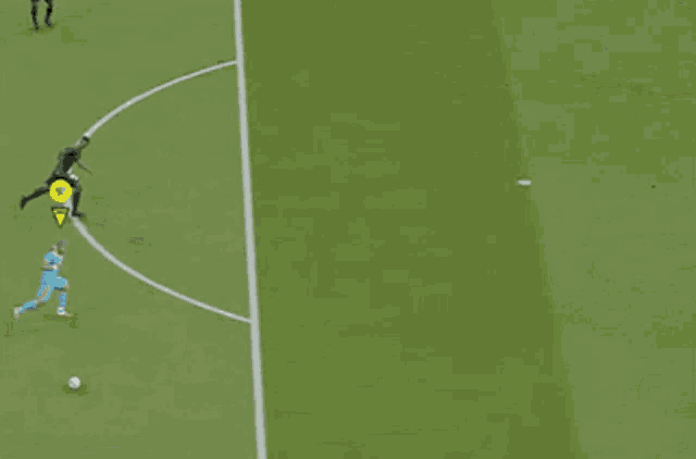 a soccer game is being played on a field with a banner that says the gunners on it