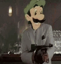 a cartoon character with a green hat and mustache is holding a gun in a bar .