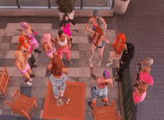 a group of people are standing around a table and chairs .