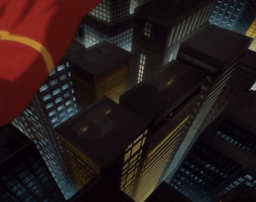 a man in a red suit is floating in a green liquid