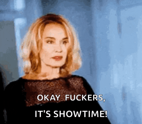 a woman says " okay fuckers it 's showtime "