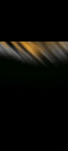 a blurred image of a person 's face with a black background .
