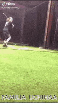 a person is swinging a bat on a baseball field with the words familia uchihaa below them