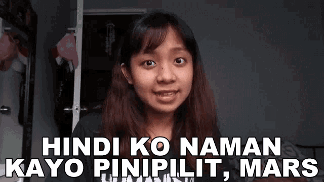 a girl is standing in front of a closet with the words hindi ko naman kayo pinipilit , mars