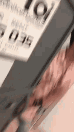 a close up of a person 's arm with a name tag on it