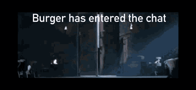 a man in a hooded jacket is standing in a doorway with the caption burger has entered the chat