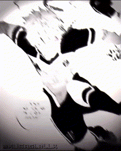 a black and white photo of a person 's feet with the letters lp on the bottom right corner