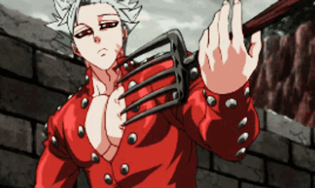 a man in a red jacket is holding a large fork in his right hand