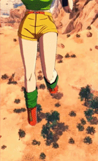a woman in shorts and green socks is running through a desert .