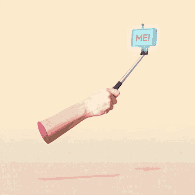 a person taking a selfie with a stick that says me on it