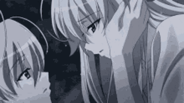 a couple of anime characters are looking at each other and touching each other 's faces .