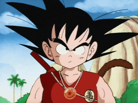 a cartoon character named goku is wearing a red shirt and necklace