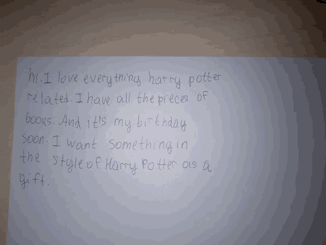 a piece of paper that says ' hi i love everything harry potter related i have all the pieces of books ' on it