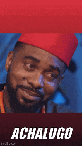 a man with a beard is wearing a red hat and the word achalugo is on the bottom