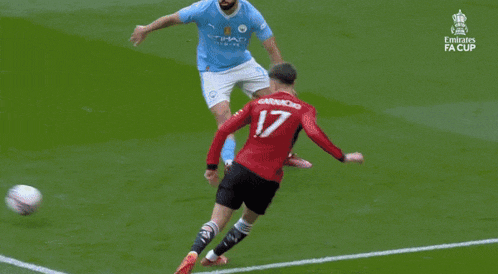 a soccer game is being played in front of a sign that says england