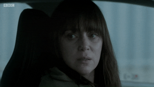 a woman is sitting in a car with bbc written on the bottom right