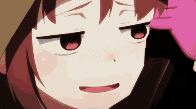 a close up of a girl 's face with a pink glove on her head