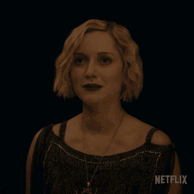 a woman says we 're so close with a netflix logo in the background