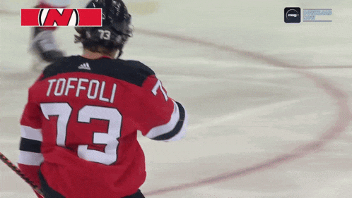 a hockey player with the name toffoli on their jersey