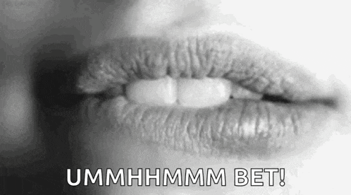 a black and white photo of a woman 's lips with the words `` ummhhmm bet '' written below it .
