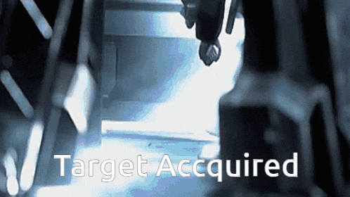 a sign that says target acquired on it in white letters