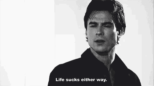 a black and white photo of a man with the words life sucks either way below him