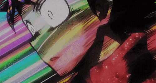 a close up of a person 's face with a rainbow of colors coming out of it .