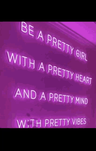 a purple sign that says `` be a pretty girl with a pretty heart and a pretty mind with pretty vibes ''