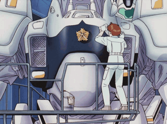 a man stands in front of a robot with a badge on it that says police