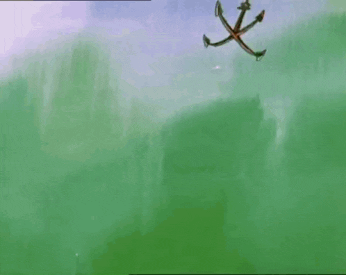 a drawing of an anchor hanging from a rope on a green background