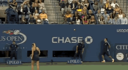 a chase bank logo is on the side of a blue wall