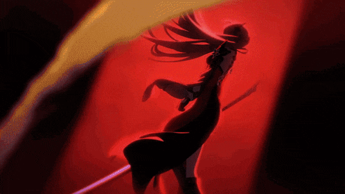 a silhouette of a woman holding a sword in a red light
