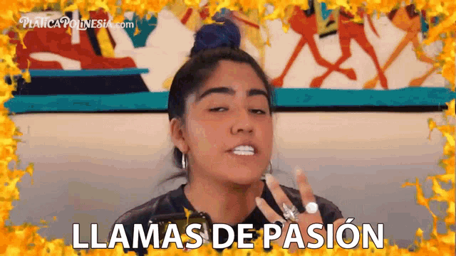 a woman says llamas de pasion with flames behind her