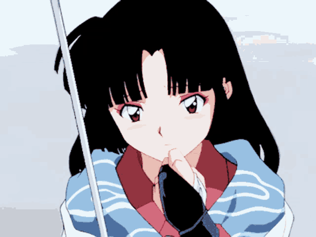 a girl with long black hair is holding a sword in her hand
