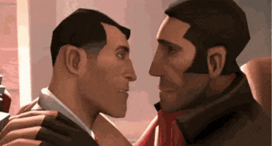 a couple of men are standing next to each other and kissing .