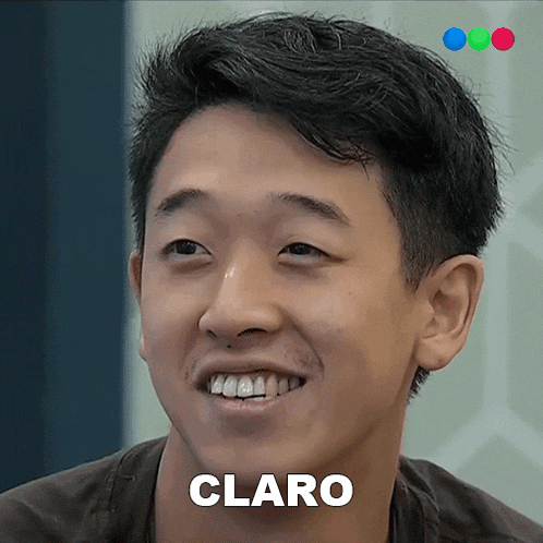 a close up of a man 's face with the word claro on the bottom