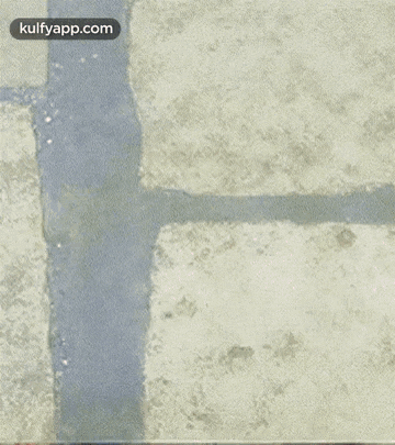 a close up of a person 's face with the words kulfyapp.com at the top