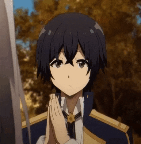 a close up of a person holding a sword with their hands together .
