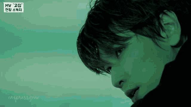 a close up of a person 's face with the words empressgene written on the bottom