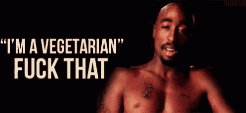 a shirtless man with the words " i 'm a vegetarian fuck that " above him