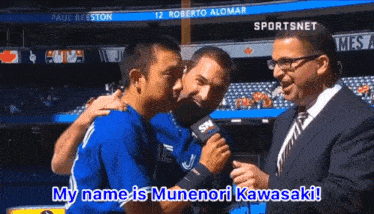 a man in a blue jersey is being interviewed by sportsnet